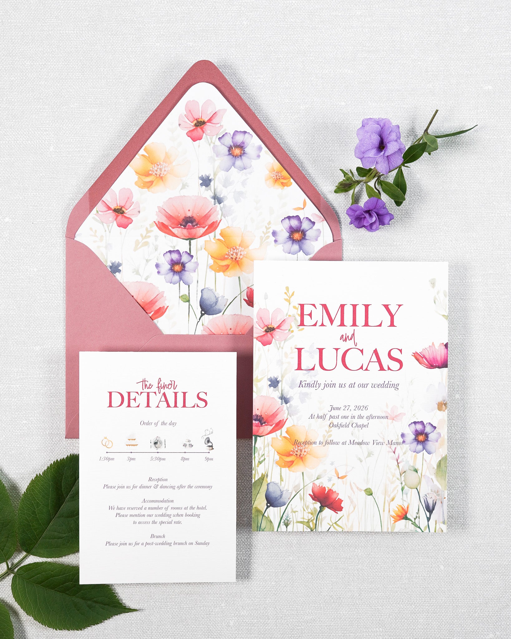 Floral wedding invitation with a rose pink envelope. The invitation is in a hanpinted garden print