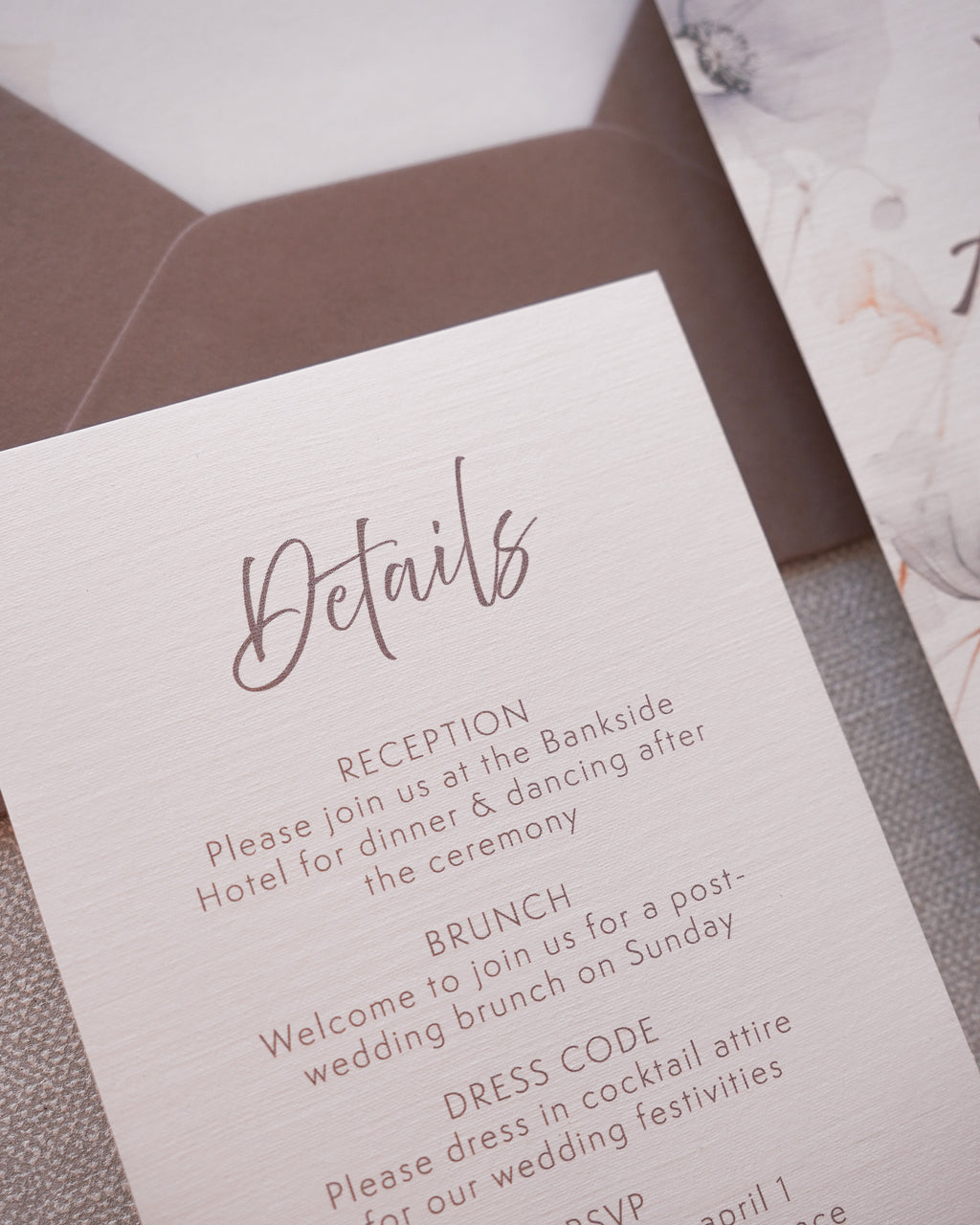 A close up on a wedding invitation detail card