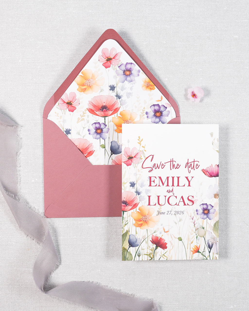 A wedding Save The Date card in a garden print. Matched with a rose pink envelope